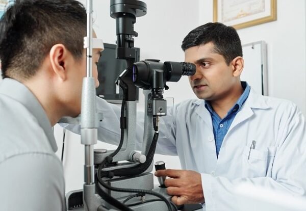 Indian,Serious,Optometrist,Working,With,His,Patient,He,Using,Special