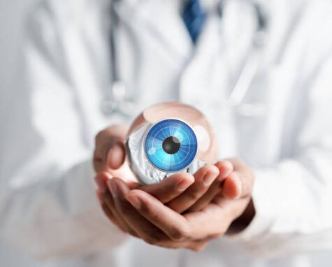 Digital vision eye care concept. Doctor using technology for eye test vision, checking eyesight, Eye clinic appointment.