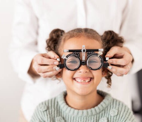 Vision, optometrist and portrait of child with glasses to test, check and examine eyesight. Healthcare, medical and young girl in doctor office for eye examination, optical diagnostic and examination
